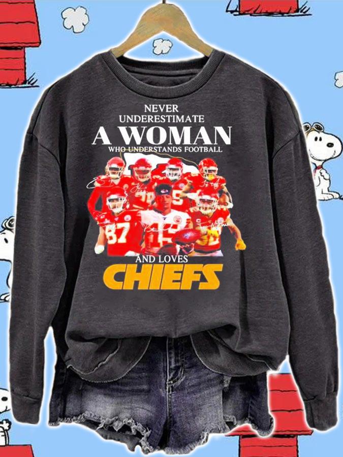 Never underestimate a woman who understands football and Chiefs shirt sweatshirt