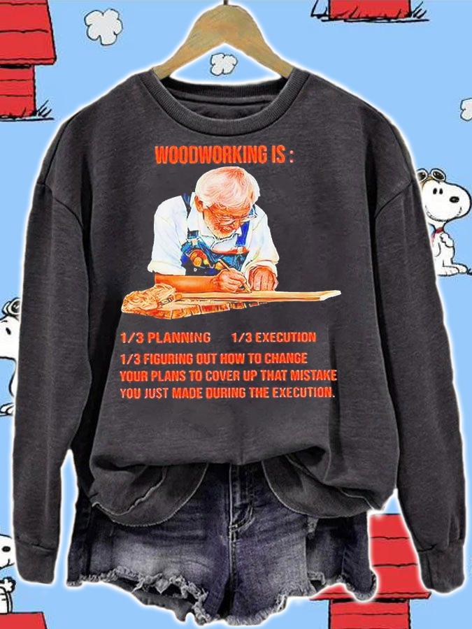 Carpenter woodworking is planning execution figuring out how to change T-shirt sweatshirt