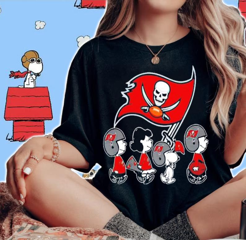 The Peanuts Snoopy and Friends cheer for the Tampa Bay Buccaneers NFL shirt woman shirt